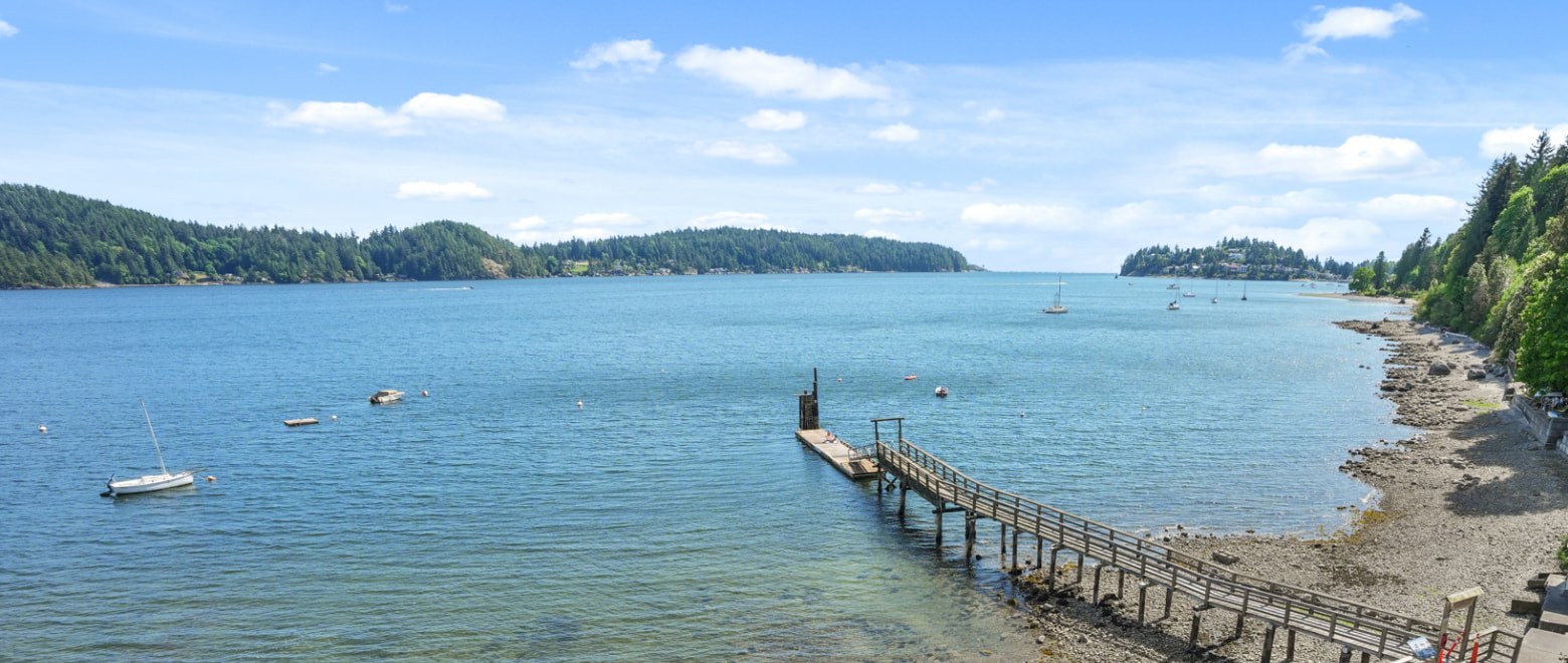 A quiet dock reaching into the bay below Grantham House